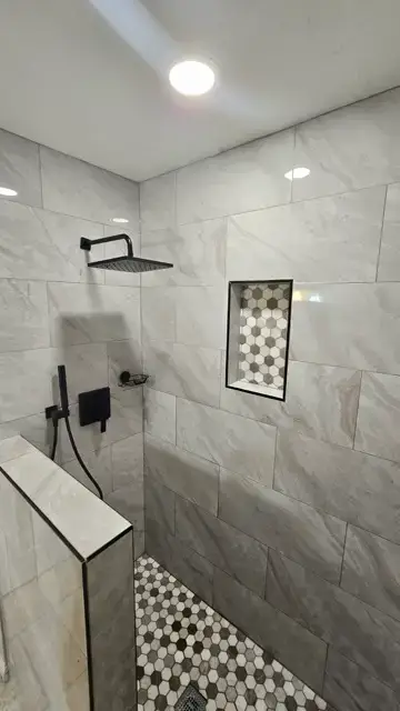 Luxurious marble-tile shower remodel by Justus Bath in Edmond, Oklahoma