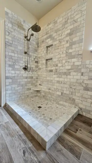 Contemporary bathtub and shower combo remodel by Justus Bath in Edmond, Oklahoma