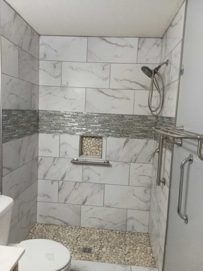 Marbled shower after tub conversion.