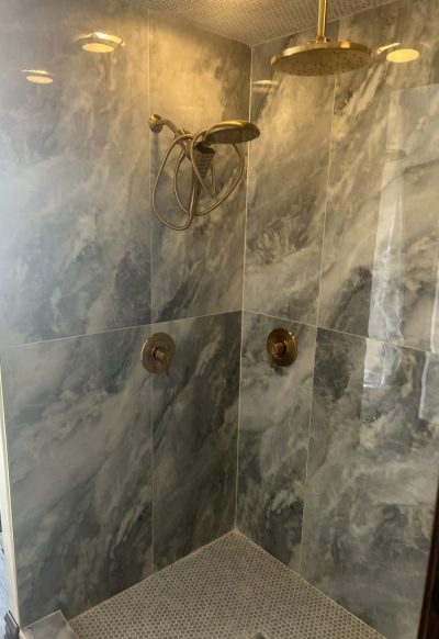 Alternate view of marbled shower remodeling.